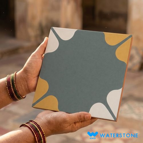Athangudi tile held in hand